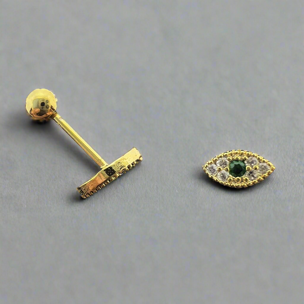 Green Eye Ear Piercing